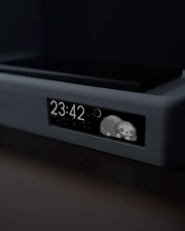 Design render close-up: the clock on the left, the sloth awake on the right